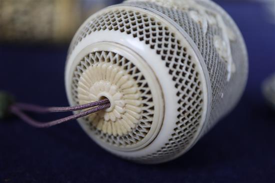 Two 19th century Chinese ivory pomanders and a similar purse